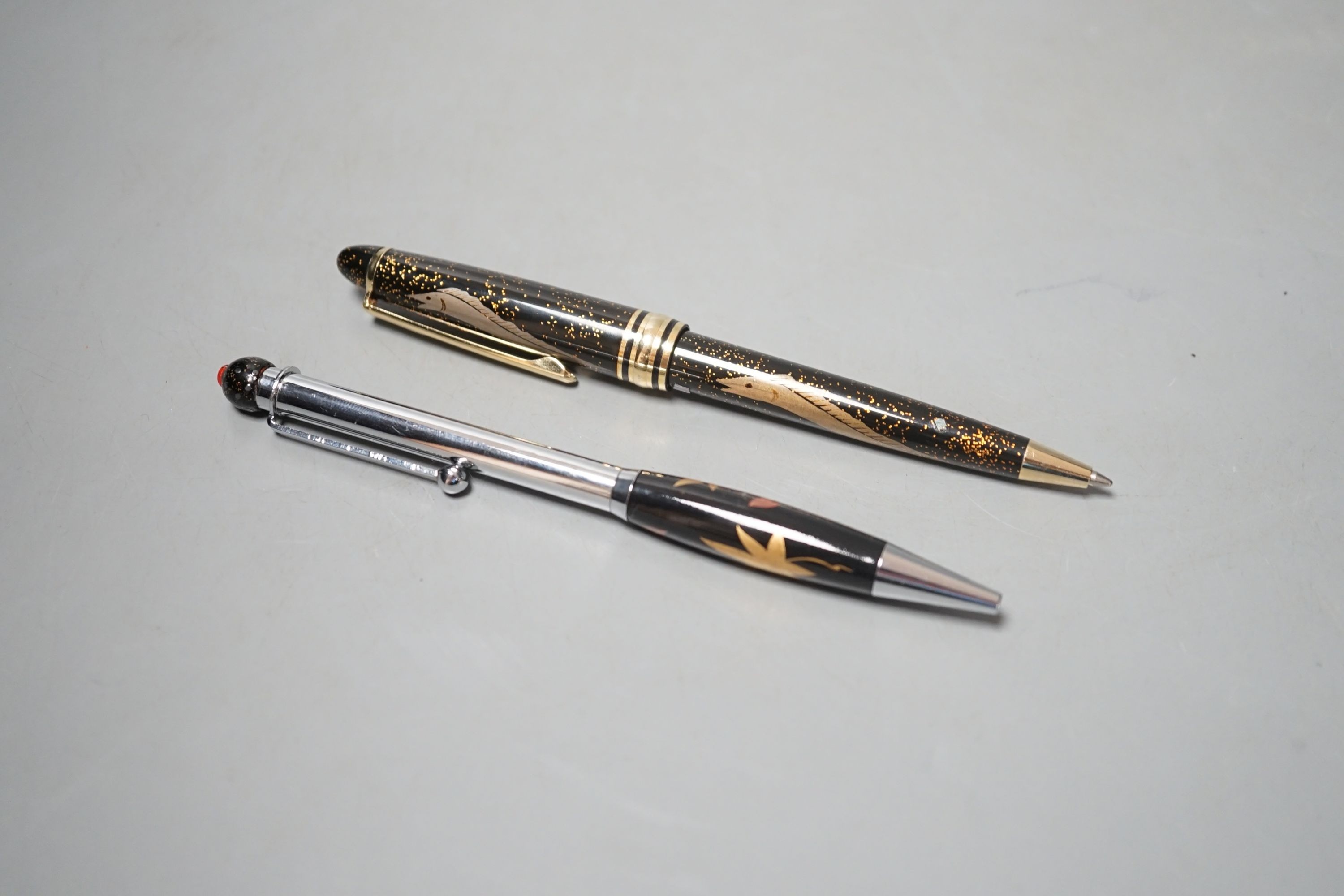 Two Japanese Namiki type Maki-e lacquer ballpoint pens